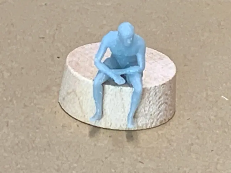 Chinese Man Sitting Leaning Forward 1