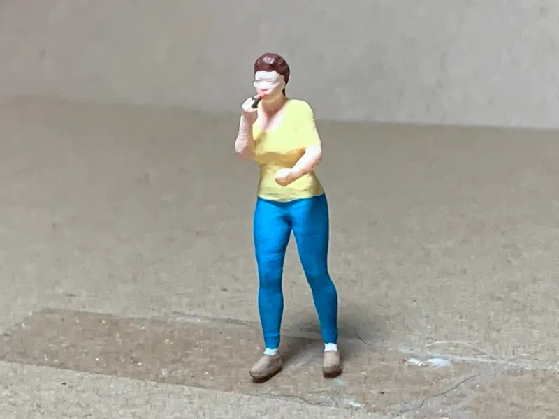 Female Applying Lipstick 1