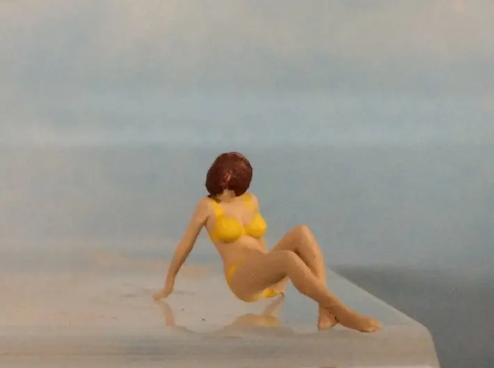 Female Bikini Sitting Ground 1