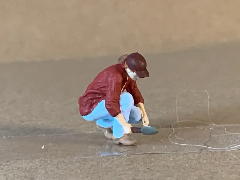 Female Squatting W/Trowel 1