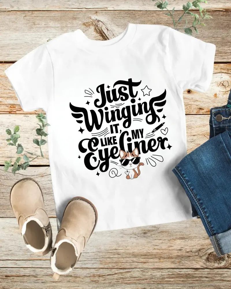 Just Winging It Like My Eyeliner Kid Cotton T-Shirt 1