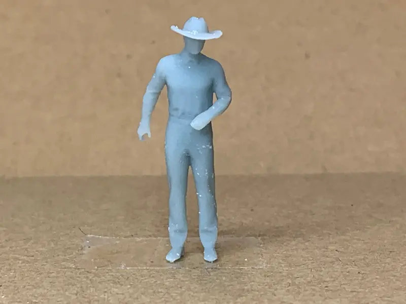 Man Standing Arm Bent Wearing Large Hat 1