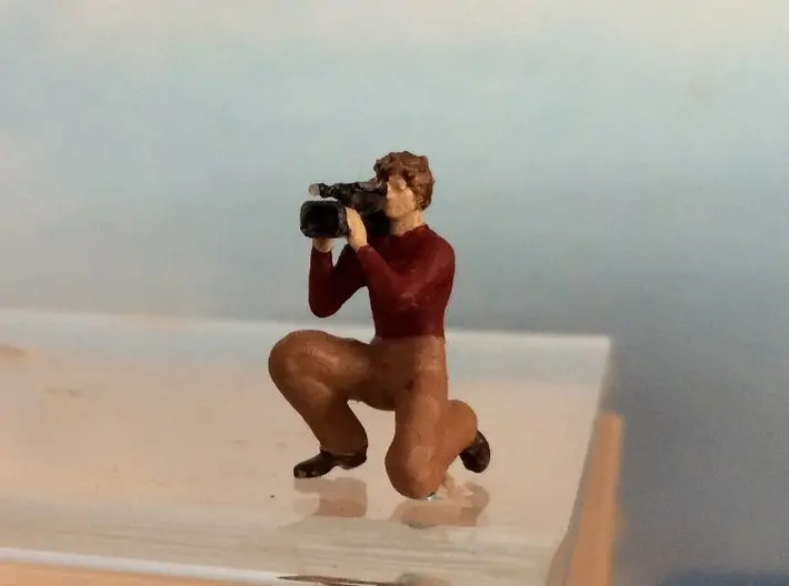 Video Cameraman Kneeling 1